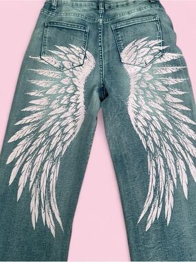urban weekend blue mid rise jeans with light pink angel wings